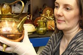 Researcher Jo Gooding with items from the Dresser collection. THE WORK of a leading Victorian figure is to take centre stage at a Middlesbrough museum ... - featured-christopher-dresser-472549734