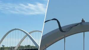 Protester scales Frederick Douglass Bridge, sparking shutdown