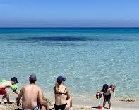 Immagine di family enjoying the beach in San Vito Lo Capo