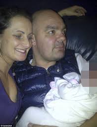 Criticism: Grainger, pictured holding a baby, with his girlfriend Gail Hadfield who hit out at police - article-2109978-12092E2A000005DC-151_634x830