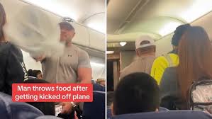 WATCH: Jealous man throws food as he’s kicked off plane