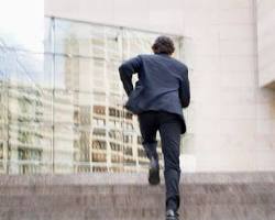 صورة person running up stairs