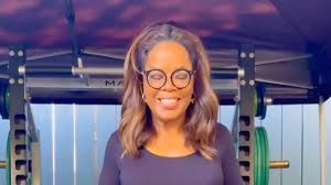 Oprah, 72, shocks fans by hoisting heavy weights at gym after 50-lb weight loss