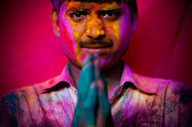 ... powder poses for a photograph during Holi celebrations at the Bankey Bihari Temple in Vrindavan, India on on March 21, 2011. (Majid Saeedi/Getty Images) - h01_10510135