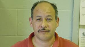 Guillermo Madrigal Ballesteros is wanted for organizing the transport of illegal immigrants. - ballesteros-mugshot