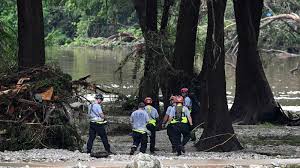 Search teams looking for flood victims