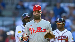 Philadelphia Phillies and Atlanta Braves players during an MLB playoff game