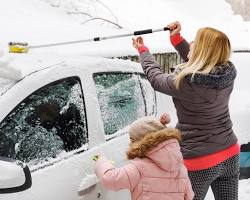 Image of Washing a car in winter