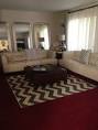 Burgundy carpet living room