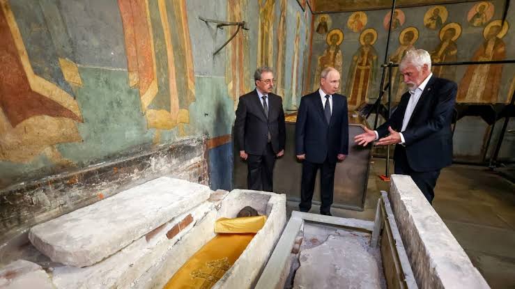 Putin visits remains of medieval Russian prince Dmitry Donskoy, uncovered in Kremlin cathedral; discovery surprised historians