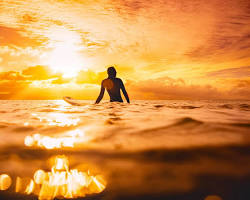 person looking at a beautiful sunset
