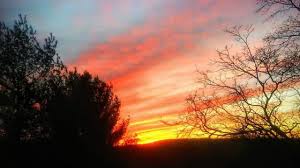 Flurries to start the day, colder and windy too