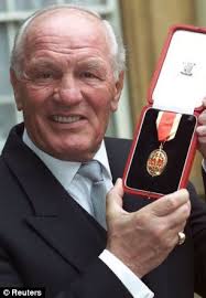 Henry Cooper smiles after being knighted by the Queen at Buckingham Palace on February 22, - article-1382549-0BDDA32F00000578-888_306x441