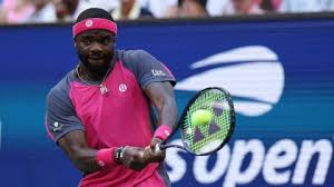Alex Michelsen competing against Frances Tiafoe in the US Open quarter-final