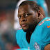 Warren Buffett Wore Pads Under a Ndamukong Suh Jersey on the...