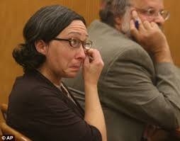 Accused: Kimberly Fry wipes away tears as she listens to her husband testifying against her at her murder trial - article-2039701-0E00D7CA00000578-145_468x367