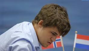 Magnus Carlsen defeated Ivan Sokolov to take the sole lead with 4.5/6 Carlsen was downbeat after the game, Sokolov got a level opening but was steadily ... - 6_carlsen_300