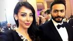 بالفيديو.. تامر حسني وزوجته يتخطيان