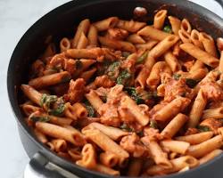 Image of Creamy Tomato Pasta with Spinach and Sausage