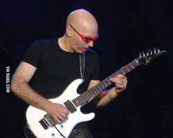 Image of Vin Diesel playing the bass guitar
