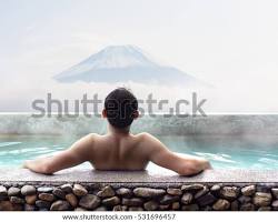 Image of person relaxing in a hot spring