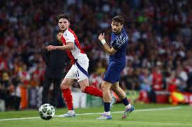 The Goalscorer and the Strategist: Kvaratskhelia vs Rice for the Champions League