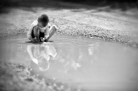 Image result for boy in mud puddle image