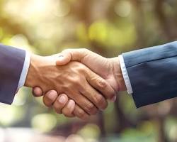 Image of two people shaking hands, symbolizing a partnership