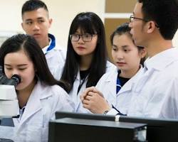 Gambar modern Chinese laboratory with students conducting experiments