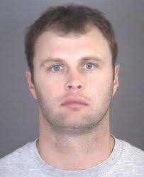 NASCAR driver Travis Wade Kvapil, 37, was charged with assault after incident at home with his wife, police say. - 23649743_BG1