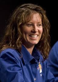 Endeavour mission specialist Tracy Caldwell smiles after a comment during a crew briefing July 11, 2007 at Johnson Space Center in Houston. - NASA%2BIntroduces%2BAstronauts%2BUpcoming%2BShuttle%2Bd2DpWJY8riml