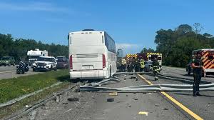 Four injured in charter bus crash causing significant delays on I-95 in St. Johns County
