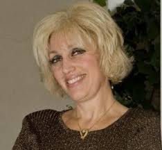 Laguna Niguel attorney and dentist Orly Taitz, one of 14 GOP candidates in the ... - orly-taitz-smile