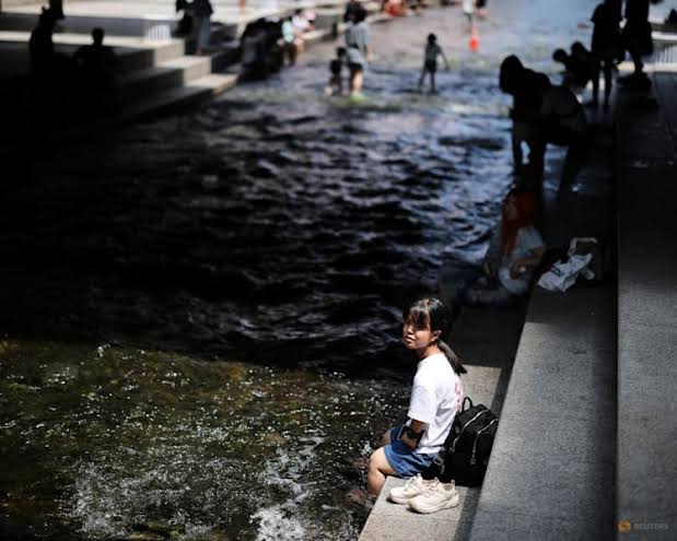 Record heatwave spreads across Korean peninsula, prompting emergency response; South Korea raises heat response level amid historic weather