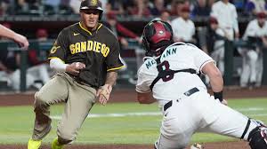 Manny Machado has four RBIs, Padres beat D-backs 9-4 to gain ground in NL wild card race