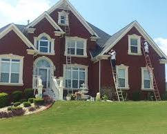 Image of beautifully painted home exterior, showcasing a fresh coat of paint and meticulous trim work