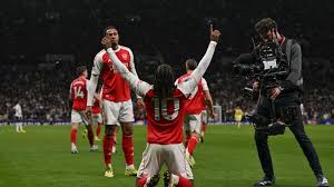 Arsenal's Eze sinks Spurs again, Liverpool late show floors Forest