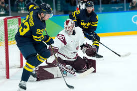Red Wings’ Larkin, Raymond set for Olympic quarterfinal showdown