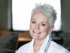 Barnyard owner Debbie Davidson says embracing her grey hair has given her a unique sense of style and is a great deal easier than regular cover ups. - 996130215