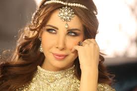 نانسي عجرم  Images?q=tbn:ANd9GcQOQ7HhWoTyK1WIEojaaseZrtbAKkliLgElRX_Ana82i1tkpgEpkA