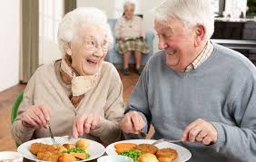 Image result for happy people eating at a restaurant