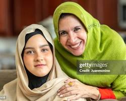 Image of candid photo of a Pakistani woman laughing