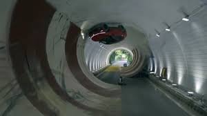 China just made Mercedes' dream from 16 years ago a reality by driving a 5,700lb electric SUV across tunnel's ceiling with 360-degree loop