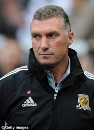 Nigel Pearson has been offered Â£1million a year and a Â£1m bonus to get Leicester City back into the Barclays Premier League. - article-2058740-0EB533AB00000578-518_306x423