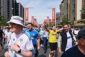 The moment Leeds fans burst into song outside Wembley awaiting squad
