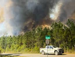 Firefighters tackle 400-acre brush fire in Nassau County, road closures in effect