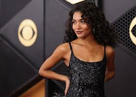 Olivia Dean Is the Ultimate Showgirl in Glitter and Feathers at the Grammys