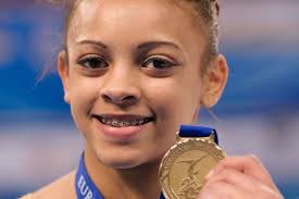 Ellie Downie has made British gymnastics history by winning Britain&#39;s first ever women&#39;s all-around medal in a European Championships after taking junior ... - ellied2014