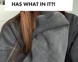 Image of someone checking the ingredients of a dry shampoo