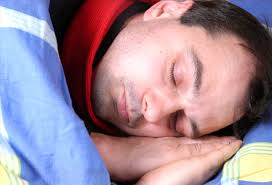 Image result for picture of a man sleeping on a bed